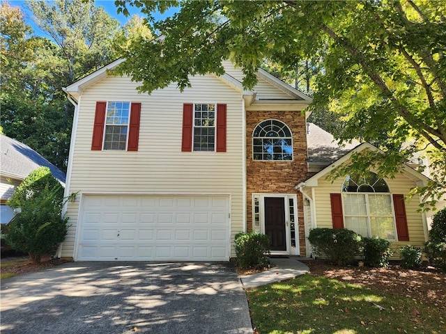 view of front of home featuring a garage