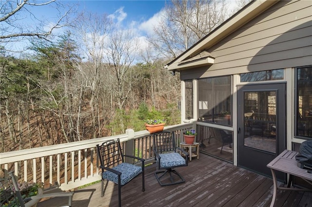 deck featuring a sunroom