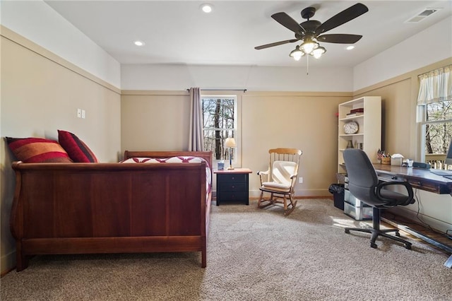 carpeted bedroom with ceiling fan