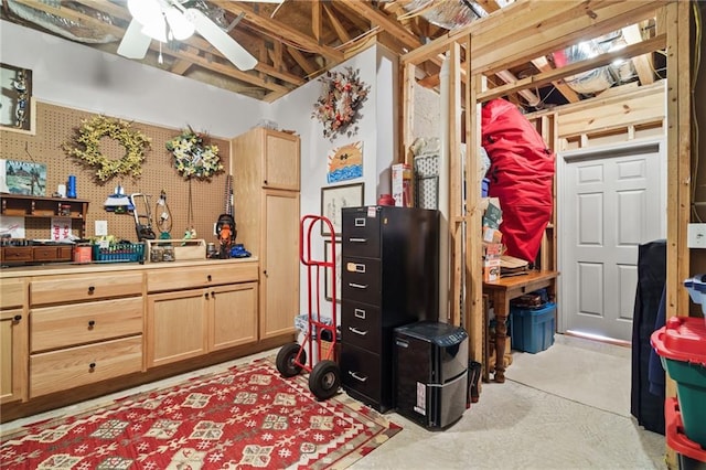 interior space with ceiling fan