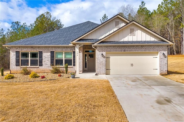 craftsman inspired home featuring brick siding, an attached garage, driveway, and a front yard