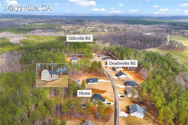 aerial view featuring a forest view