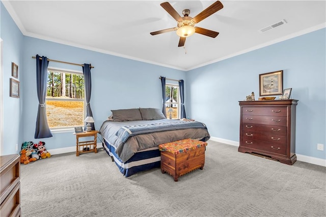 bedroom with visible vents, multiple windows, and baseboards