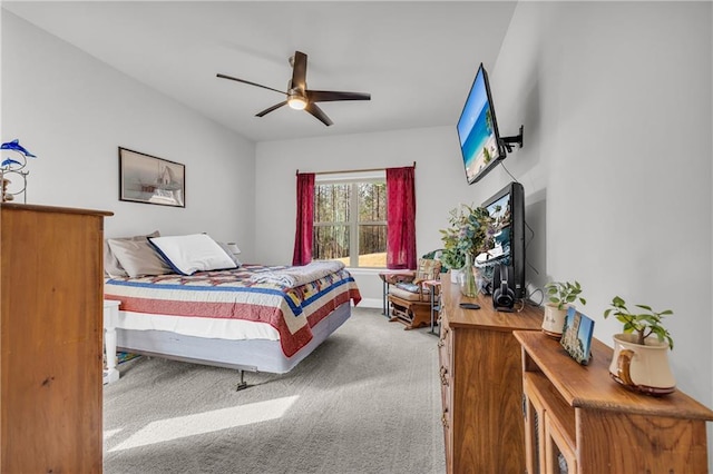 carpeted bedroom with a ceiling fan