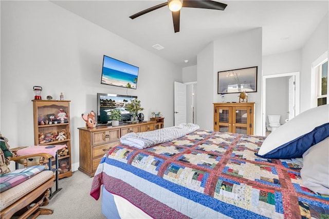 bedroom with ceiling fan, visible vents, and light carpet