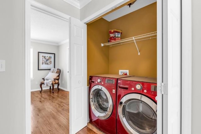 420 Heritage Park Trce NW Unit 22, Kennesaw, GA 30144 - washroom featuring independent washer and dryer, ornamental molding, and wood finished floors