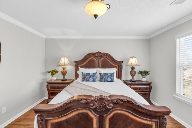 420 Heritage Park Trce NW Unit 22, Kennesaw, GA 30144 - bedroom with wood finished floors and crown molding