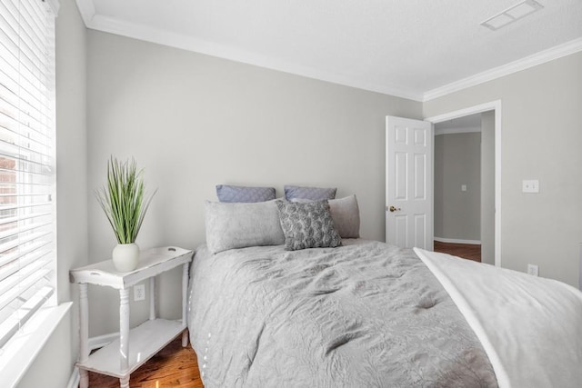 420 Heritage Park Trce NW Unit 22, Kennesaw, GA 30144 - bedroom with ornamental molding and wood finished floors
