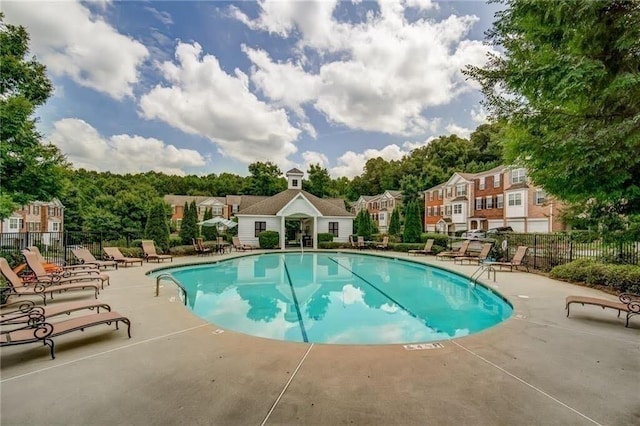 420 Heritage Park Trce NW Unit 22, Kennesaw, GA 30144 - community pool featuring a patio