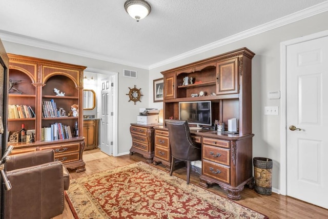 420 Heritage Park Trce NW Unit 22, Kennesaw, GA 30144 - home office featuring ornamental molding, light wood-style floors, and a textured ceiling