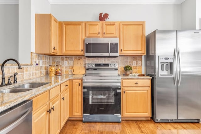 420 Heritage Park Trce NW Unit 22, Kennesaw, GA 30144 - kitchen featuring appliances with stainless steel finishes, light stone countertops, light brown cabinetry, tasteful backsplash, and ornamental molding
