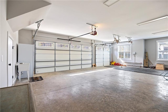 garage featuring a garage door opener