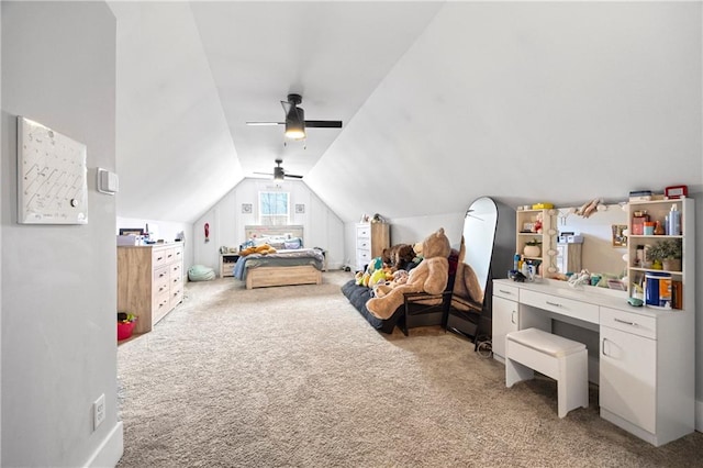 bedroom with light carpet, vaulted ceiling, and ceiling fan