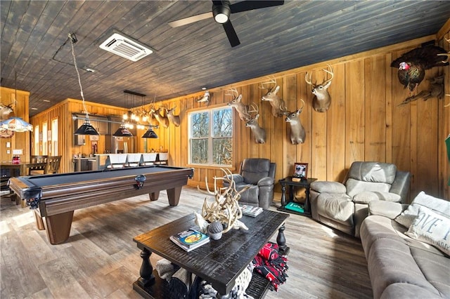 game room with wood walls, billiards, visible vents, and wood finished floors