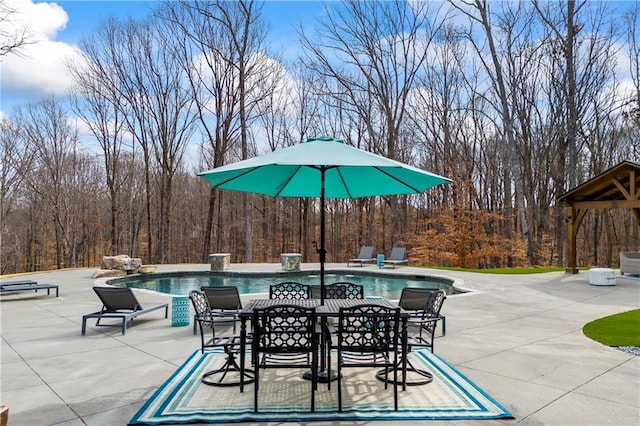 view of patio with a gazebo and an outdoor pool