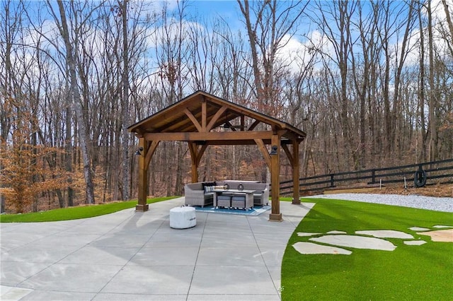 view of patio / terrace with a gazebo and fence