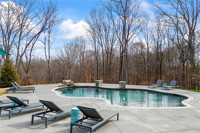 pool with a patio