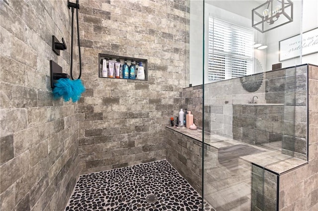 bathroom featuring tiled shower