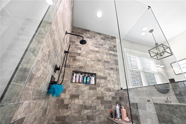 full bathroom featuring recessed lighting and a walk in shower