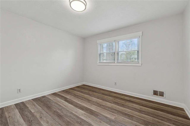 1573 Deerwood Ln, Acworth, GA 30102 - unfurnished room with dark wood-type flooring