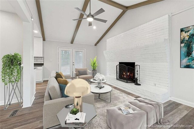 1573 Deerwood Ln, Acworth, GA 30102 - living room featuring ceiling fan, french doors, dark hardwood / wood-style flooring, lofted ceiling with beams, and a fireplace