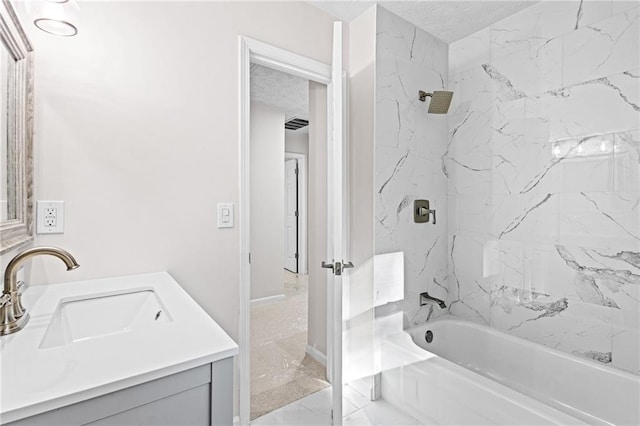 full bathroom with visible vents, shower / tub combination, marble finish floor, a textured ceiling, and vanity