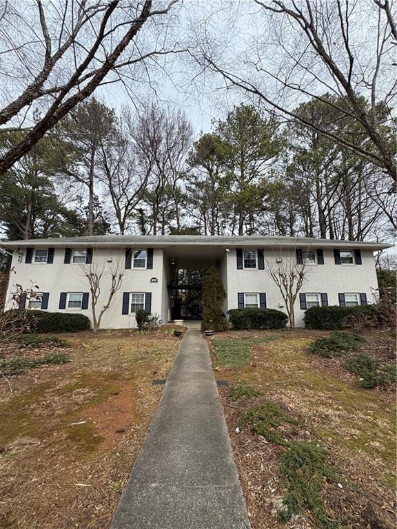 view of front of house featuring a carport