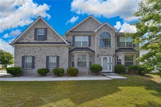 1441 Saint George Pl, Conyers, GA 30012 - traditional-style house featuring a front lawn and brick siding