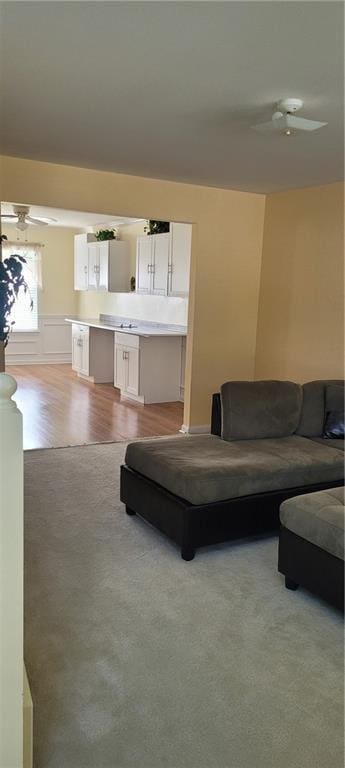1441 Saint George Pl, Conyers, GA 30012 - living area featuring ceiling fan and light carpet