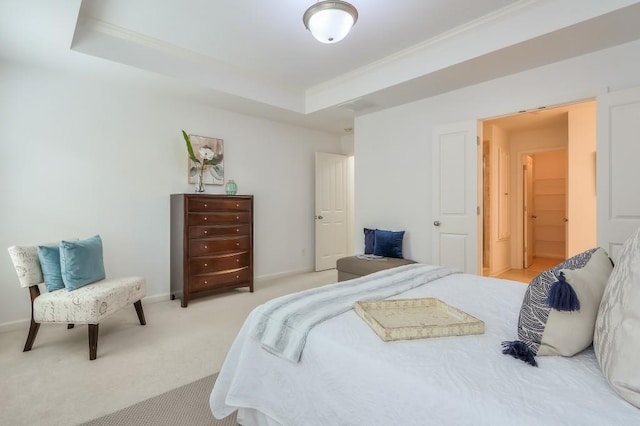 bedroom with light carpet, baseboards, a raised ceiling, and ornamental molding