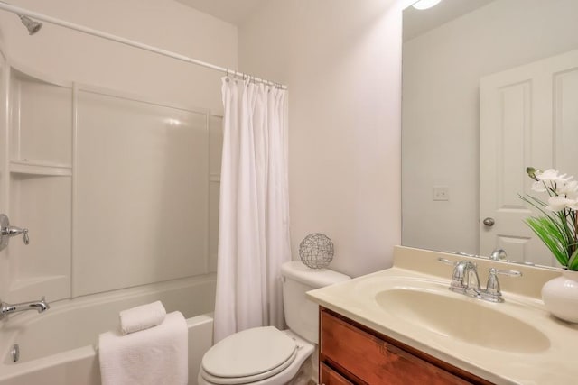 bathroom with shower / bath combination with curtain, vanity, and toilet