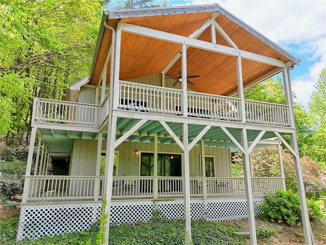 1133 Ridgepole Dr, Sky Valley, GA 30537 - rear view of property featuring board and batten siding, ceiling fan, and a wooden deck