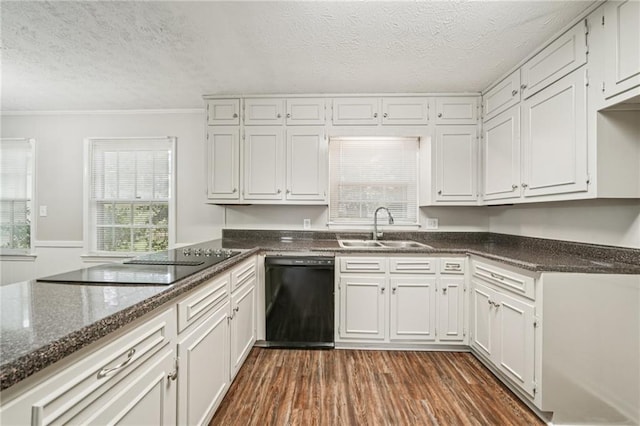 2466 Country Club Dr, Conyers, GA 30013 - kitchen with black appliances, a textured ceiling, dark wood-style flooring, dark stone counters, and ornamental molding
