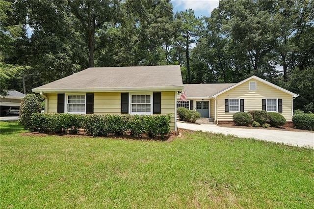 2466 Country Club Dr, Conyers, GA 30013 - single story home with a front lawn and concrete driveway