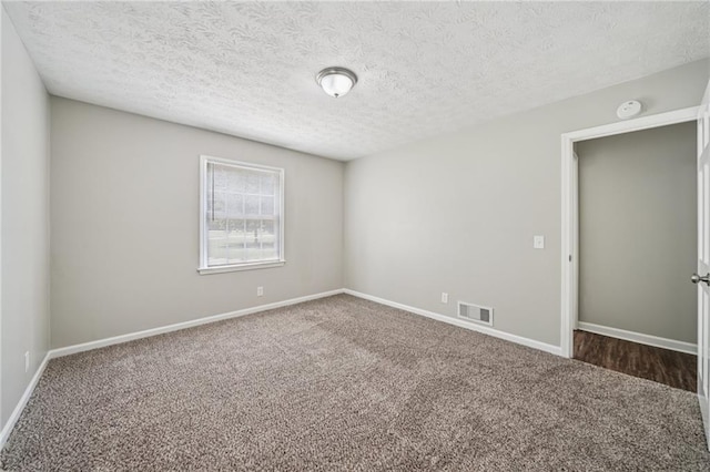 2466 Country Club Dr, Conyers, GA 30013 - carpeted empty room with a smoke detector and a textured ceiling
