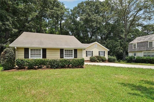 2466 Country Club Dr, Conyers, GA 30013 - view of front of home with a front lawn