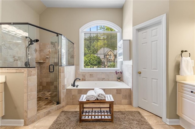 290 Edwardton Ct, Roswell, GA 30076 - full bathroom featuring vanity, a bath, a stall shower, tile patterned floors, and vaulted ceiling