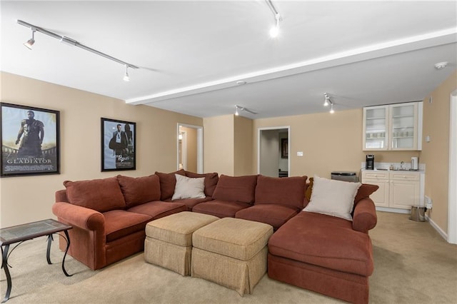 290 Edwardton Ct, Roswell, GA 30076 - living room featuring rail lighting, light colored carpet, and wet bar