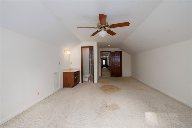 full bathroom with sink, tile patterned floors, toilet, and combined bath / shower with glass door