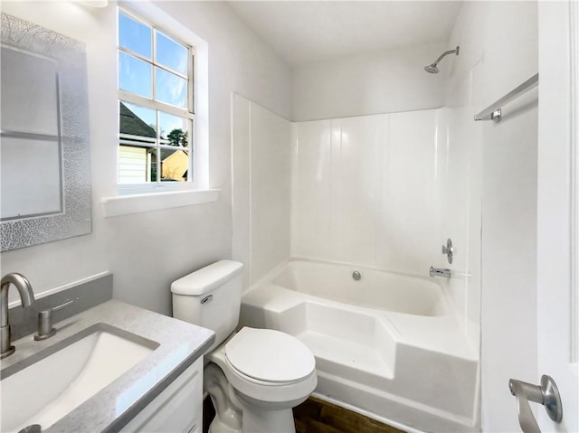 full bathroom with vanity, toilet, and shower / washtub combination