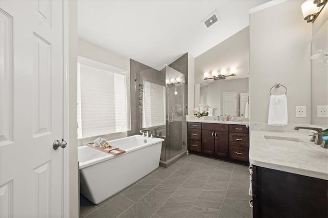 2870 Tattersall Ct, Cumming, GA 30041 - full bathroom featuring a shower stall, two vanities, a soaking tub, and vaulted ceiling