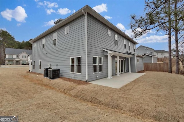250 Stonecreek Pkwy, Covington, GA 30016 - rear view of property with a patio area