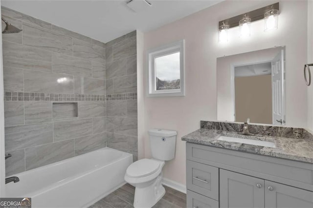 250 Stonecreek Pkwy, Covington, GA 30016 - full bathroom featuring vanity, shower / bath combination, and wood finished floors