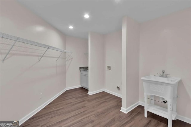 250 Stonecreek Pkwy, Covington, GA 30016 - laundry area with washer hookup, wood finished floors, and recessed lighting