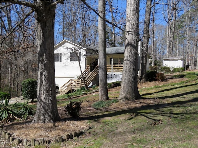 view of front of home with stairway