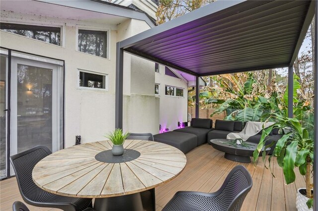 wooden deck with outdoor lounge area