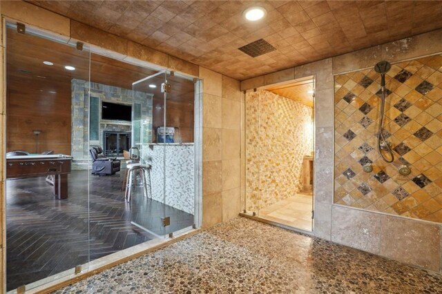 interior space featuring tile walls