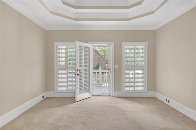 1405 Wilmington Way, Grayson, GA 30017 - carpeted empty room featuring ornamental molding, a tray ceiling, and baseboards