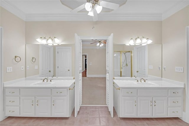 1405 Wilmington Way, Grayson, GA 30017 - full bath featuring ceiling fan, ornamental molding, two vanities, tile patterned floors, and baseboards