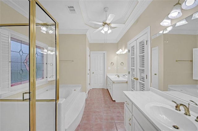 1405 Wilmington Way, Grayson, GA 30017 - bathroom with two vanities, ceiling fan, ornamental molding, a garden tub, and tile patterned floors